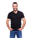 Young happy man in a black polo shirt Royalty Free Stock Photo