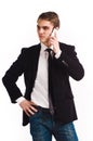Young happy man holding mobile phone Royalty Free Stock Photo