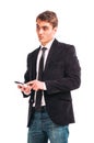 Young happy man holding mobile phone Royalty Free Stock Photo