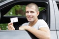 young happy man showing new driver license Royalty Free Stock Photo