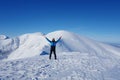 Young happy man at the top of Kopa Kondracka during winter, Zakopane, Tatry mountains, Poland Royalty Free Stock Photo