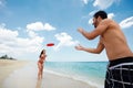 Young happy man and woman playing with frisbee Royalty Free Stock Photo