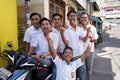 Young happy muslim students in white uniform