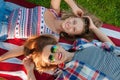 Young happy patriot women on the united states flag Royalty Free Stock Photo