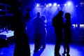 Young happy people are dancing in club. Nightlife and disco concept Royalty Free Stock Photo