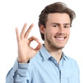 Young happy positive teenager man gesturing ok Royalty Free Stock Photo