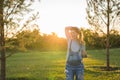 Young happy pregnant woman relaxing and enjoying life in autumn nature Royalty Free Stock Photo