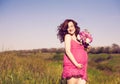 Young happy pregnant woman relaxing and enjoying life in nature. Royalty Free Stock Photo