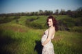 Young happy pregnant woman relaxing and enjoying life in nature. Royalty Free Stock Photo