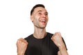 Young happy smiling man with clenched fists, looking up, isolated on white background Royalty Free Stock Photo