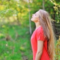 Young happy smiling woman doing deep breath Royalty Free Stock Photo