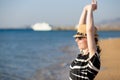 Young happy smiling woman stretching Royalty Free Stock Photo