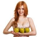 Young happy smiling woman with three green apple