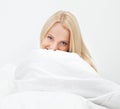 Young happy smiling woman waking up Royalty Free Stock Photo