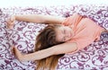 Young happy smiling woman waking up Royalty Free Stock Photo