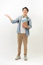 Young happy student carrying books Royalty Free Stock Photo