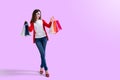 Young happy summer shopping woman with shopping bags Royalty Free Stock Photo