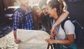 Young happy tourists sightseeing in city Royalty Free Stock Photo