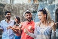 Young happy tourists sightseeing in city. Royalty Free Stock Photo