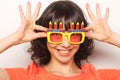 Young happy woman with big orange sunglasses Royalty Free Stock Photo