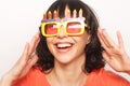 Young happy woman with big orange sunglasses Royalty Free Stock Photo