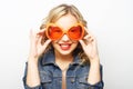 Young happy woman with big orange sunglasses Royalty Free Stock Photo