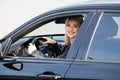 Young happy woman bought new modern car. Royalty Free Stock Photo
