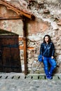 Young happy woman at Corvin Castle, Romania Royalty Free Stock Photo