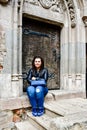 Young happy woman at Corvin Castle, Romania Royalty Free Stock Photo