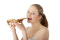 Young happy woman eating pizza Royalty Free Stock Photo