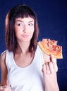 Young happy woman eating pizza Royalty Free Stock Photo