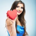 Young happy woman hold Love symbol red heart. Isol
