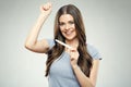 Young happy woman holding pregnansy test. Royalty Free Stock Photo