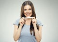 Young happy woman holding pregnansy test.