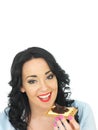 Young Happy Woman Holding a Wholegrain Cracker with Cheese and Pickle