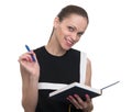 Young happy woman holds notepad and pen Royalty Free Stock Photo