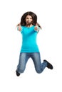 Young happy woman jumping with thumbs up Royalty Free Stock Photo