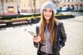 Young happy woman, listening music and having fun on the street Outdoor. Royalty Free Stock Photo