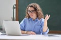 Young happy woman online teacher teaching video call remote class on laptop. Royalty Free Stock Photo