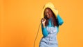 Young happy woman singing at microphone Royalty Free Stock Photo