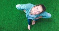 Young happy woman standing in green grass Royalty Free Stock Photo