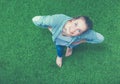 Young happy woman standing in green grass Royalty Free Stock Photo