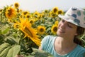 Young happy woman in sunflower field Royalty Free Stock Photo