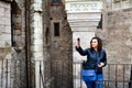 Young happy woman taking a selfie at Corvin Castle, Romania Royalty Free Stock Photo