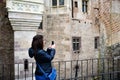 Young happy woman taking a selfie at Corvin Castle, Romania Royalty Free Stock Photo