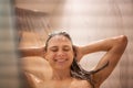 Young happy woman taking a shower washing her hair and head Royalty Free Stock Photo