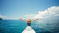 Happy woman traveling on the boat in the ocean Royalty Free Stock Photo