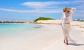 Young happy woman walking on the beach Royalty Free Stock Photo