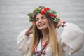 Young happy woman wearing tradisional closes and wreath Royalty Free Stock Photo