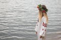 Young happy woman wearing tradisional closes and wreath Royalty Free Stock Photo